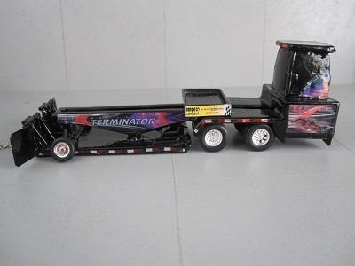 toy tractor pulling sled