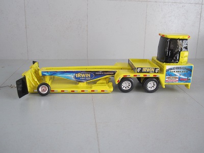 toy tractor pulling sled